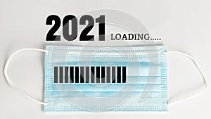 2021 loading progress with disposal face mask.