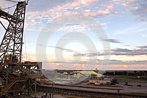 Loading terminal for loading bulk cargo of chemical sulphur to sea bulk carriers using a shore crane. Beaumont, Texas, USA. Ju