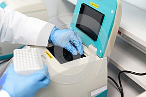 Loading test tubes with sampled DNA for PCR