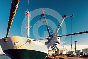 Loading and unloading of the ship in the port with cranes in Eur