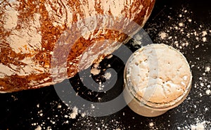 Loaf of artisan wheat and rye bread with graham flour.