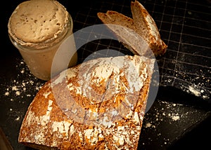 Loaf of artisan wheat and rye bread with graham flour.