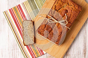 Loaf Of Banana Bread On Cutting Board