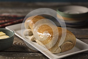 Loaf of bread on white plate