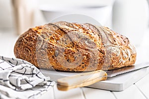 Loaf of bread on white table