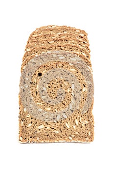 Loaf of fresh sliced multigrain gluten free bread with sesame, flax seeds, isolated on white. front view.