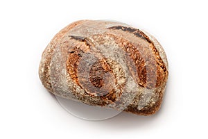 Loaf of homemade rustic bread isolated on a white background