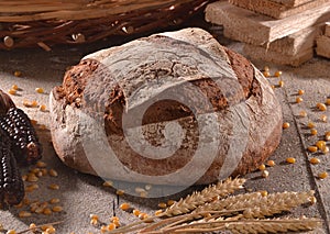 Loaf of integral bread on rural rustic ambient