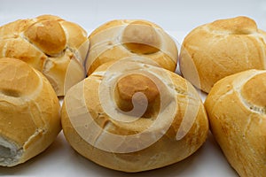 Loaf of Rosetta bread on white background. Michetta, traditional Italian bread