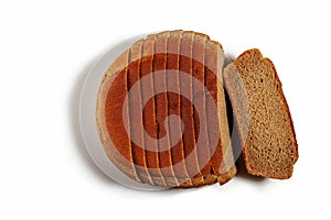 A loaf of rye bread cut into pieces