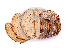 Loaf and slices of bread isolated on white