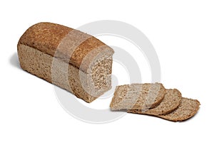 Loaf of spelt bread and slices