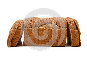 A loaf of whole grain bread on white