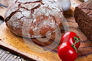 Loafs of bread and vegetables