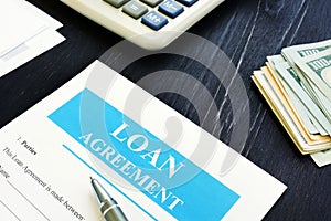 Loan Agreement form with cash and calculator