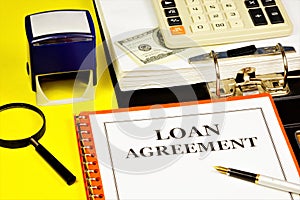 Loan agreement - the inscription of the text in the document folder planning.