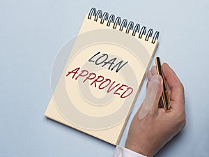 Loan approved inscription on paper. Financial borrowing and lending concept