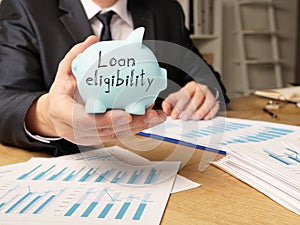 Loan eligibility is shown on the business photo using the text