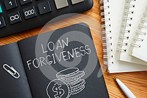Loan forgiveness is shown using the text and picture of coins