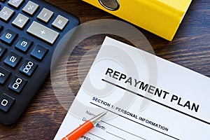 Loan repayment plan application form and calculator. photo