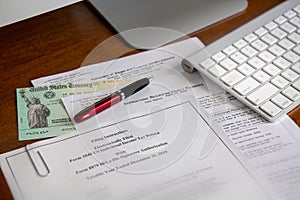 Loan and Tax paperwork with stimulus check