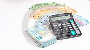 Loans and debts concept. Euro banknotes Laid out in a fan on white background. Money finance earning sector concept. Copy space fo photo