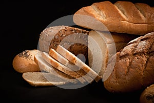 Loave of bread, cereals on white