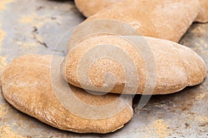 Loaves of puffed homemade Egyptian pita