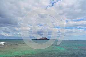 Lobos Island in emeral waters. Corralejo, Fuerteventura, Spain