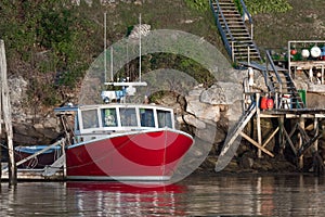 Lobster boat docked in early autumn in South Bristol, Maine, United States