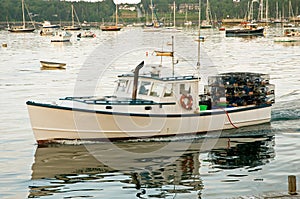 Lobster boat leaving harbor