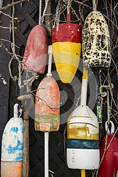 Lobster Buoys on wall in Maine