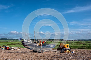 A Fisherman on a Shingle Beach