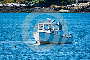 Lobster fishing boat in autumn in coastal Maine, New England