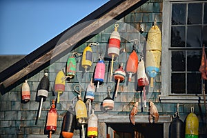 Lobster floats on side of house in Acadia National Park