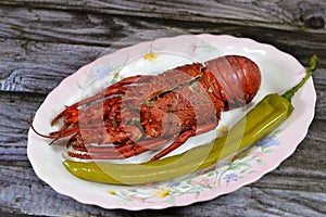 Lobster meal cooked and served, Lobsters are a family Nephropidae, Homaridae of marine crustaceans, with long bodies and muscular