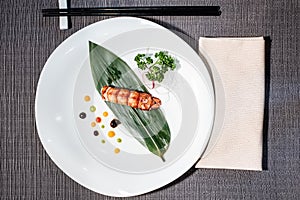 Lobster nigiri on a bamboo leaf, japanese food