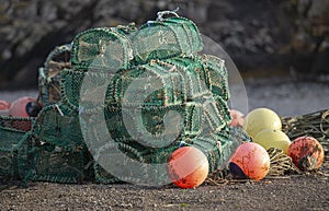 Lobster Pots and buoys on Scarinish Harbour Wall