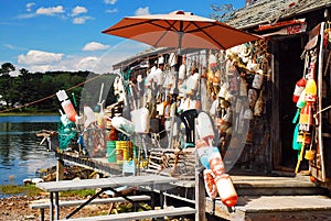 A lobster shack in Maine with buoys