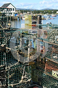 Lobster traps, with harbor in background