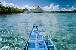 Local banca boat on tour trip to the protected famous Snake Island El Nido, attractions tourist locations Palawan in the