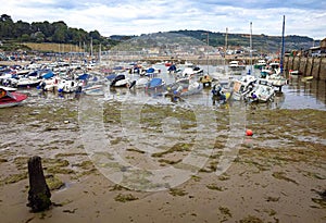 Local boats on the sandy intertidal zone at low tide