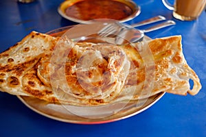 Local breakfast of Prata and curry, in Singapore