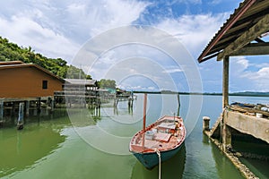 Local fishing boats moored along the coast in Chonburi Province