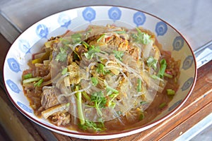 Local food of Thai in the north of Thailand. Red curry with chicken banana stalk.