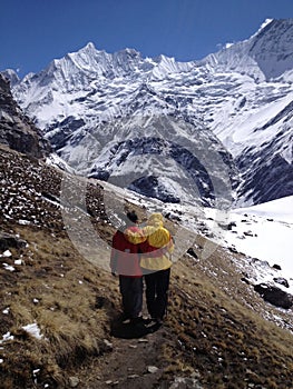Local guide help trekker during trekking at Annapurna