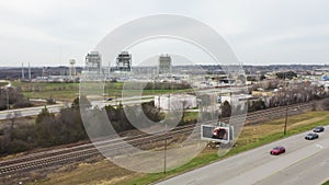 Local highway, railroad and power plant three units over thousand megawatts of natural gas fueled electric generation facility photo