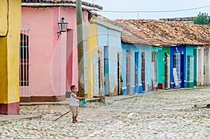 Local kid playing on the street in Trinidad, Cuba