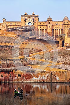 Local men fishing in Maota Lake near Amber Fort, Rajasthan, India