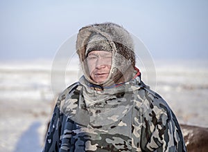 Local resident of the tundra, reindeer herder photo